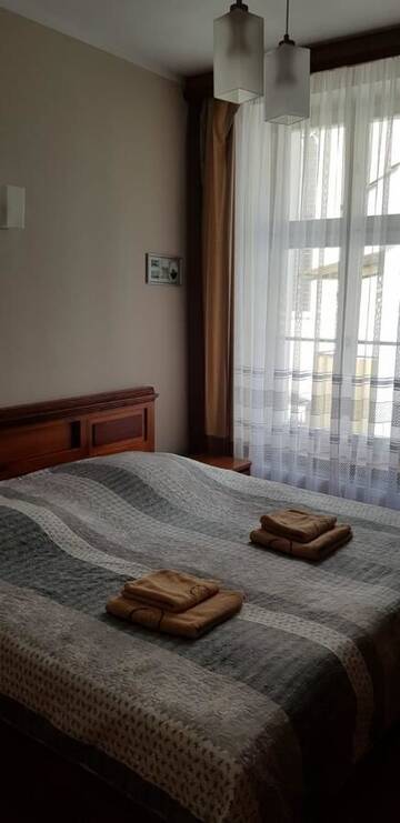 Фото номера Одноместный номер с собственной ванной комнатой Отель Hotelik City г. Гнезно 3