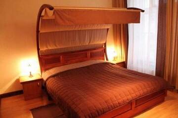 Фото номера Улучшенный двухместный номер с 1 кроватью Отель Hotelik City г. Гнезно 9