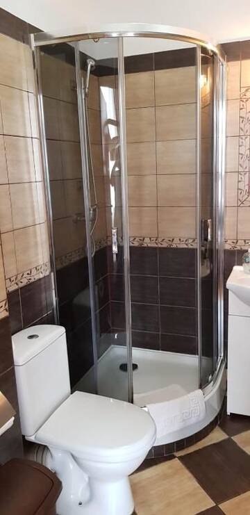Фото номера Улучшенный двухместный номер с 1 кроватью Отель Hotelik City г. Гнезно 11