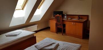 Фото номера Двухместный номер с 1 кроватью Отель Hotelik City г. Гнезно 2