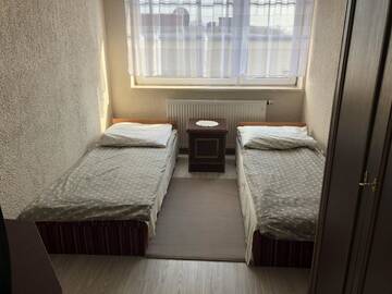 Фото номера Двухместный номер с 2 отдельными кроватями и общей ванной комнатой Проживание в семье Kwatery prywatne Jaśmin г. Гнезно 3