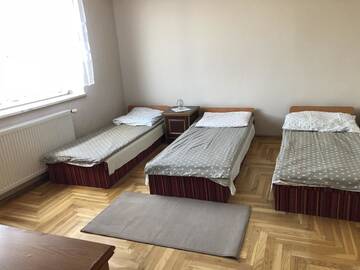 Фото номера Трехместный номер с общей ванной комнатой Проживание в семье Kwatery prywatne Jaśmin г. Гнезно 3